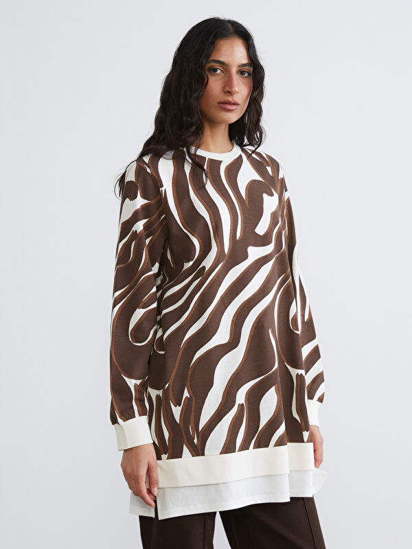 LCW Modest Patterned Sweatshirt Tunic with a Crew Neck.