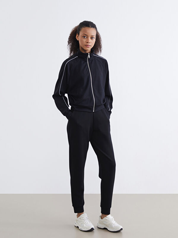 KOOR SPORT پانتۆڵی وەرزشی ژنانه‌ بە کەمەری لاستیکی