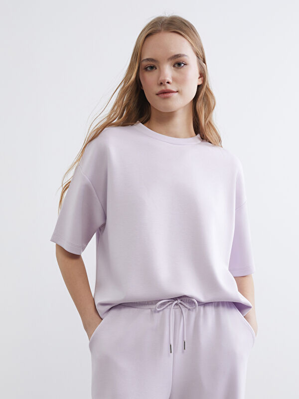 XSIDE Effortless style meets ultimate comfort in our Soft Touch Oversize Tee.