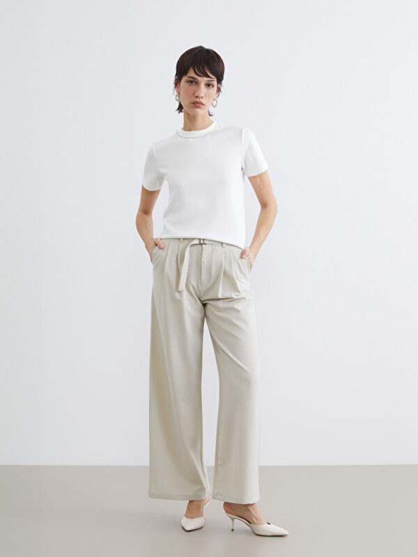 LCW Vision Belted, loose-fit, pleated trousers for women.