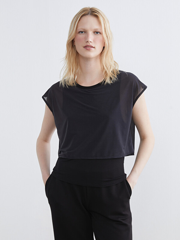 LC WAIKIKI Women's crew neck crop top.