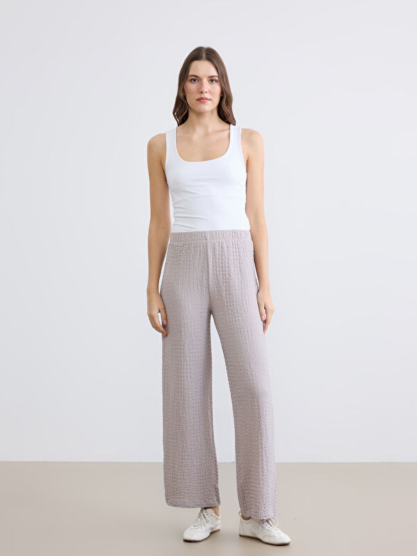 LCWAIKIKI Classic Beli Lastikli Dokulu Geniş Paça Kadın Pantolon