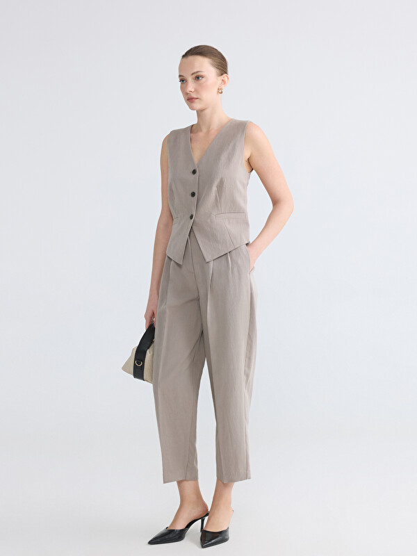 LCWAIKIKI Classic სტაფილოს ფორმის ნაკეცებიანი ქალის დობი ქსოვილის შარვალი