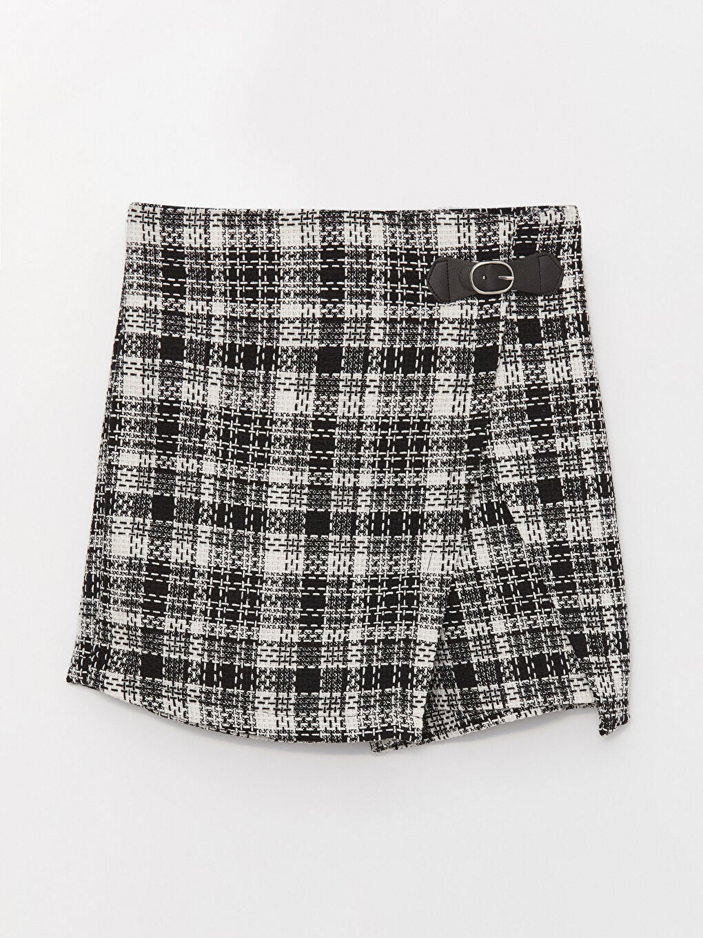 Short black and top white plaid skirt