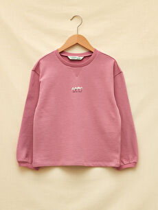 green pink sweatshirt