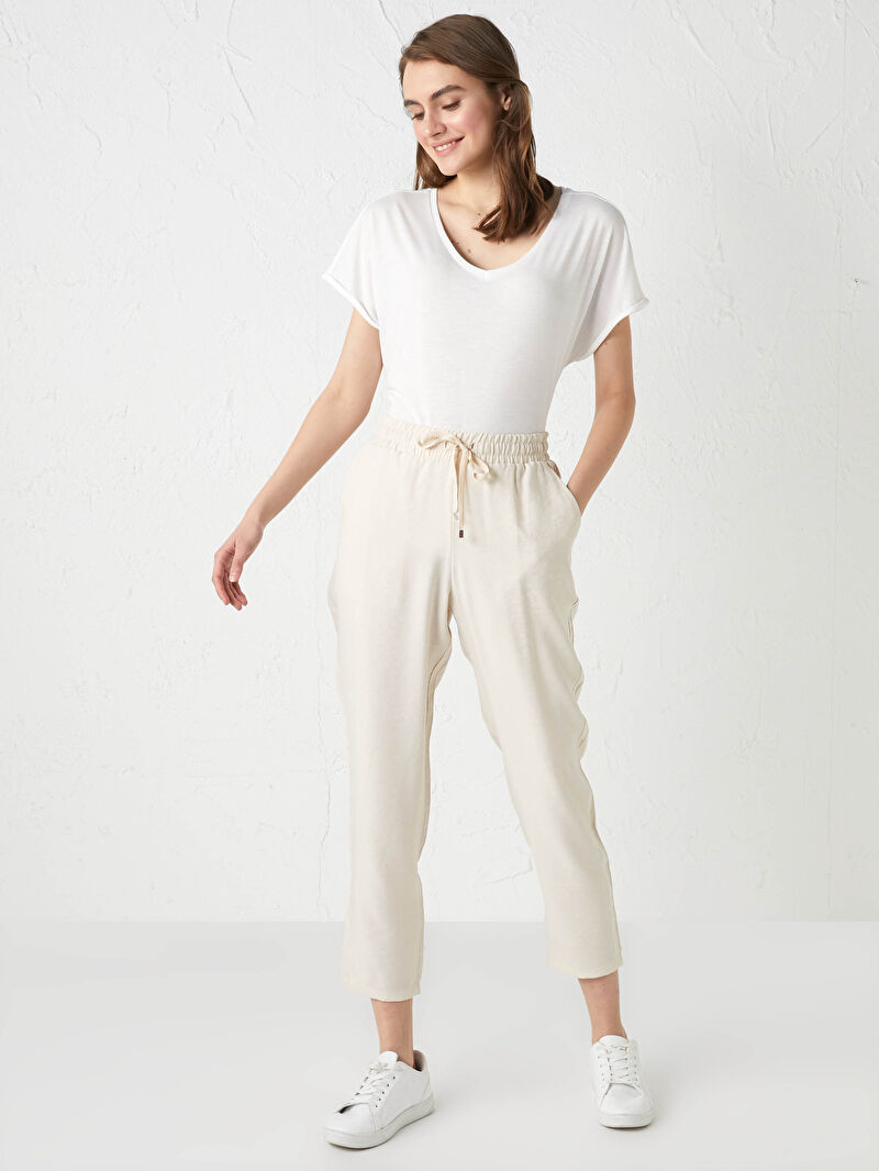 bej lcw basic beli lastikli cep detayli kadin pantolon lc waikiki